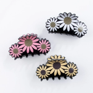 Lot de 3 pinces à cheveux en PVC avec motifs floraux marguerites en blanc, rose et jaune