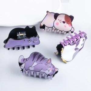Cute 9cm animal shaped PVC hair claws featuring cat and penguin cartoon designs