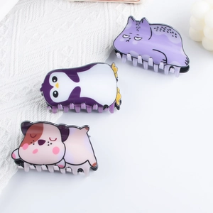 Cute cartoon animal hair claws in cat, penguin and dog shapes made of glossy PVC