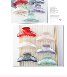 Detail of 11cm large marble textured hair claw clips in various elegant pearlescent colors