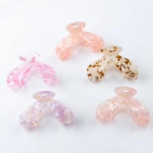 Five-piece set of butterfly acetate shark hair clips in pink floral and tortoise patterns