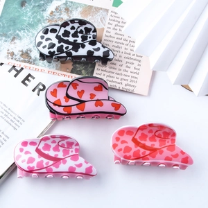 Set of cow print and heart pattern cowboy hat hair claws with glossy finish