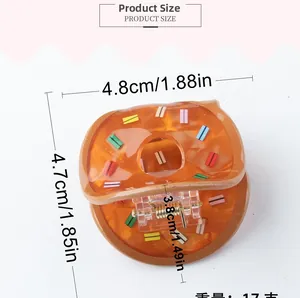Detailed view of doughnut hair claw with dimensions 4.8x4.7x3.8cm and 17g weight