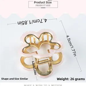Detailed size specifications for the flower hair claw clip with pink resin and gold metal