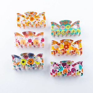 Lot de six pinces à cheveux à motif floral avec nœuds dans divers coloris vifs