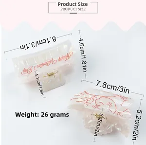 Detailed size view of iridescent acetate hair claws with Valentine patterns and dimensions