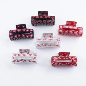 Valentine's Day 8cm acrylic hair claws with red heart and lip motifs in a 6-piece set