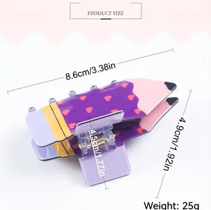 Purple pencil-shaped hair claw clip with heart pattern showing 8.6cm length dimensions