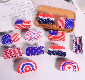 Collection of 12 US flag patterned hair claw clips in red white and blue colors