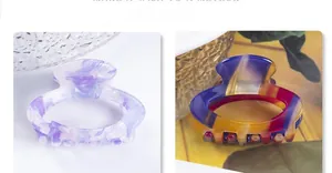 Gros plan de pinces à cheveux en acétate avec motifs marbre violet et rayures colorées