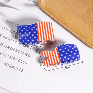 American flag hair claw clips with star and stripe patterns in wave and peace sign shapes