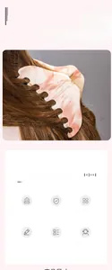 Detail of pink and white marble hair claw clip with wavy edges styled on brown hair