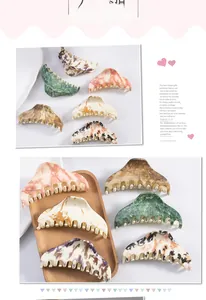 Set of six large marble pattern hair claws in acetate with assorted stylish textures