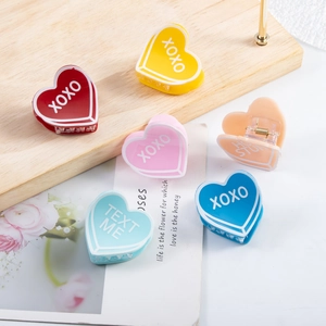 Pinces à cheveux XOXO aux couleurs acidulées vives pour un coiffage élégant et chic