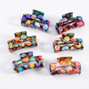 Set of six colorful Easter egg pattern square hair claws with vibrant resin finish