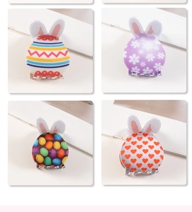 Detail of four Easter bunny hair claws with floral and geometric patterns for hair styling