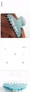 Détails d'une pince à cheveux pailletée turquoise de 9,9 cm avec texte Drama Queen et taille