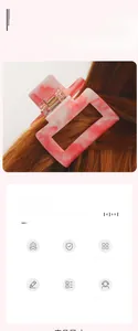 Detailed view of large square hair claw clip with pink marble water ripple texture