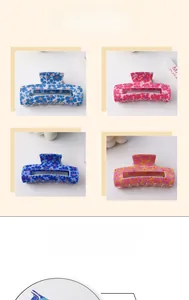 Detail of 8cm floral print hair claws in four colors with hollow rectangular design