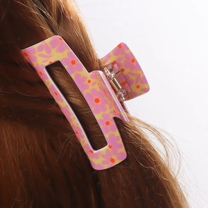Floral print rectangular hair claw clip for long hair styling in yellow and pink hues