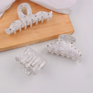 Lot de 3 pinces à cheveux marbrées blanches avec strass sur plateau en bois