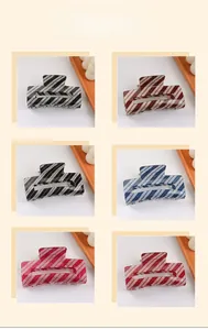 Detailed grid display of 8cm glitter PVC hair claws in six various colors for women