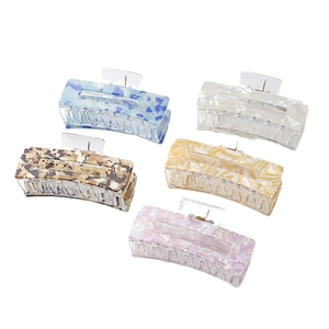 Five-piece set of large rectangular hair claws in various colorful marble and floral patterns
