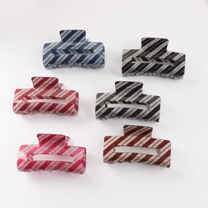 Pack of 6 rectangular glitter hair claws in assorted colors with diagonal striped pattern