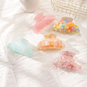 Set di cinque mollette per capelli colorate in PVC con motivi marmorei e floreali da donna