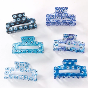 Set of 6 blue Evil Eye pattern rectangular hair claws in various acetate shades