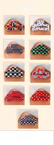 Detailed grid view of 9cm PVC hair claws with diverse checkered and leopard print patterns