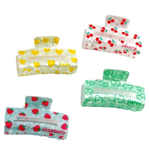 Set of four 8cm acrylic hair claws with fruit and heart prints in assorted colors
