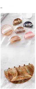 Detailed size parameters of 8.5cm acetate hair claw clips with marble texture patterns
