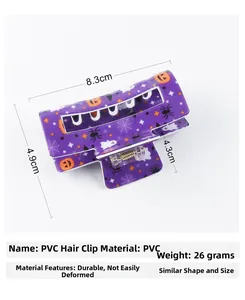 Detail view of 8.3cm Halloween claw clip featuring purple pumpkin and ghost patterns