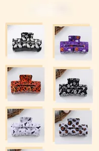 Detailed grid view of Halloween hair claws featuring ghosts, pumpkins and bats