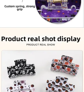 Detail of durable custom metal spring and Halloween claw clips with pumpkin patterns