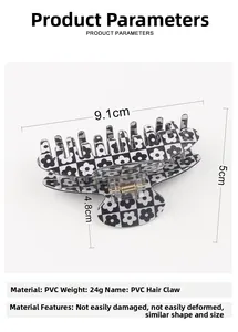 Detail view of 9.1cm black and white flower PVC hair claw with precise dimensions