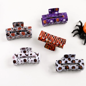 5-piece Halloween hair claw clip set with pumpkin bat and spider web acrylic patterns