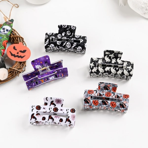 Five-piece Halloween hair claw set with pumpkin, ghost, and skull patterns for women