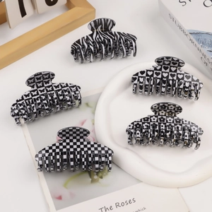 5-piece set of black and white checkered and floral pattern hair clips in acetate finish