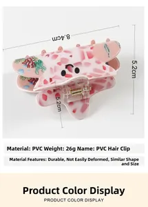 Detail view of pink PVC ocean hair claw clip with coral patterns measuring 8.4cm x 5.2cm