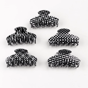 5-piece set of black and white hair claws featuring checkered and animal print patterns