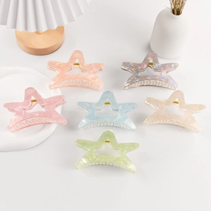 Set of six star-shaped matte pastel hair claws for women in various soft colors