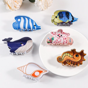 Cute 6-piece ocean animal hair claws including whale, starfish, and seahorse clips