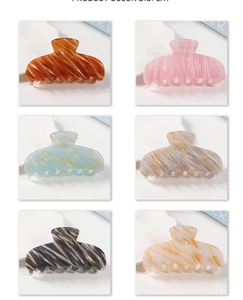 Detailed grid view showcasing six colors of large acetate marble texture hair claw clips