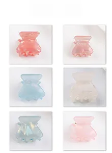 Détails de six pinces à cheveux en couleurs pastel avec un fini nacré élégant