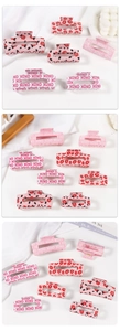Pink heart hair claw clip set with XOXO pattern and rose prints for Valentine's Day