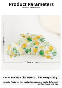 Detail view of large fruit print hair claw clip showing 10.8cm size and lemon pattern