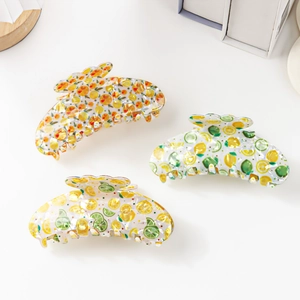 Summer hair claw clip set with colorful lemon and orange fruit patterns in acetate finish