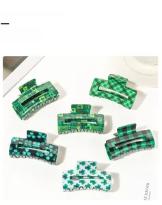 Set of six St. Patrick's Day hair claw clips with green shamrock and plaid patterns